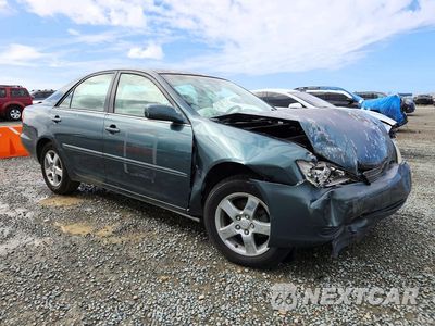Czwarte zdjęcie samochodu z boku: 2002 TOYOTA CAMRY LE VIN:4T1BE32K72U544884 - miniatura