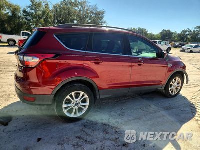 Trzecie zdjęcie samochodu z tyłu: 2018 FORD ESCAPE SE VIN:1FMCU0GD4JUC27434 - miniatura
