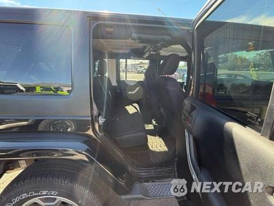 Zdjęcie 6 z 11 samochodu: 2014 JEEP WRANGLER UNLIMITED SAHARA VIN:1C4BJWEG2EL178982 - miniatura