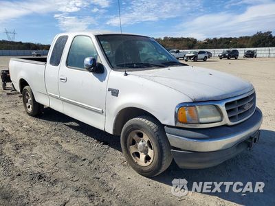 Czwarte zdjęcie samochodu z boku: 2000 FORD F150 VIN:1FTRX17L1YKA73385 - miniatura