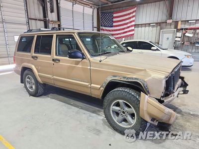 Czwarte zdjęcie samochodu z boku: 1999 JEEP CHEROKEE SPORT VIN:1J4FF68S2XL529244 - miniatura
