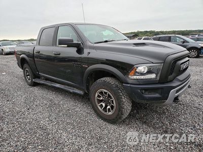 Czwarte zdjęcie samochodu z boku: 2017 RAM 1500 REBEL VIN:1C6RR7YT6HS794238 - miniatura