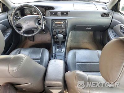 Zdjęcie 8 z 12 samochodu: 2001 TOYOTA CAMRY LE VIN:JT2BG28K110554230 - miniatura