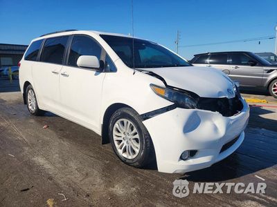 Czwarte zdjęcie samochodu z boku: 2014 TOYOTA SIENNA XLE 8-PASSENGER VIN:5TDYK3DC5ES511565 - miniatura