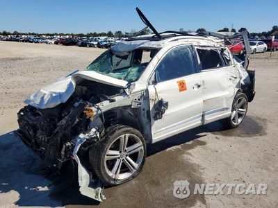 2014 VOLKSWAGEN TIGUAN S WVGAV3AX7EW021916 - główne zdjęcie licytacji z USA - miniatura