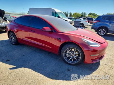 Czwarte zdjęcie samochodu z boku: 2022 TESLA MODEL 3 VIN:5YJ3E1EA3NF159769 - miniatura