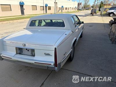 Czwarte zdjęcie samochodu z boku: 1991 CADILLAC DEVILLE VIN:1G6CD13B6M4201181 - miniatura