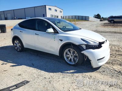 Czwarte zdjęcie samochodu z boku: 2023 TESLA MODEL Y VIN:7SAYGDEE2PA116130 - miniatura