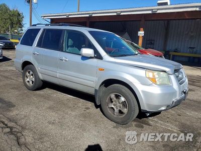 Czwarte zdjęcie samochodu z boku: 2006 HONDA PILOT EX VIN:2HKYF18416H509752 - miniatura