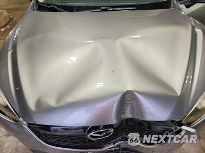 Zdjęcie 12 z 13 samochodu: 2014 MAZDA CX-5 GT VIN:JM3KE4DY0E0363723 - miniatura