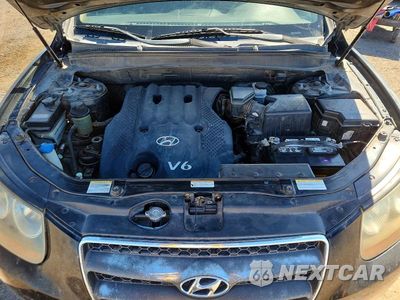 Zdjęcie 12 z 13 samochodu: 2007 HYUNDAI SANTA FE GLS VIN:KM8SG13D87U144161 - miniatura