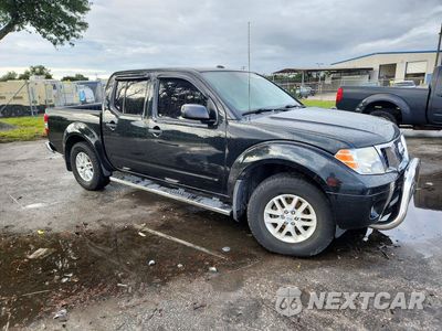 Czwarte zdjęcie samochodu z boku: 2017 NISSAN FRONTIER SV VIN:1N6DD0ER5HN771806 - miniatura