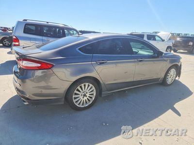 Trzecie zdjęcie samochodu z tyłu: 2013 FORD FUSION TITANIUM PHEV VIN:3FA6P0SU8DR260499 - miniatura