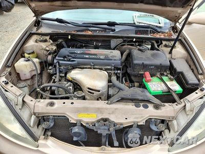 Zdjęcie 11 z 12 samochodu: 2003 TOYOTA CAMRY LE VIN:4T1BE32K63U665780 - miniatura