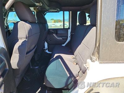 Zdjęcie 10 z 12 samochodu: 2014 JEEP WRANGLER UNLIMITED SPORT VIN:1C4BJWDG2EL317476 - miniatura