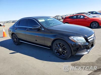 Czwarte zdjęcie samochodu z boku: 2017 MERCEDES-BENZ C 300 VIN:55SWF4JB1HU232585 - miniatura
