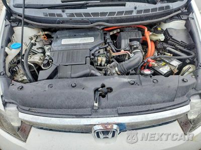 Zdjęcie 11 z 12 samochodu: 2006 HONDA CIVIC HYBRID VIN:JHMFA362X6S006630 - miniatura