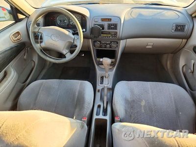 Zdjęcie 8 z 12 samochodu: 2001 TOYOTA COROLLA CE VIN:1NXBR12E51Z482239 - miniatura