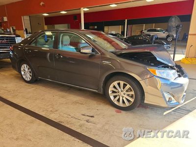 Czwarte zdjęcie samochodu z boku: 2014 TOYOTA CAMRY HYBRID XLE VIN:4T1BD1FK0EU134384 - miniatura