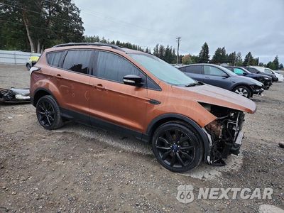 Czwarte zdjęcie samochodu z boku: 2017 FORD ESCAPE TITANIUM VIN:1FMCU9J90HUC38837 - miniatura