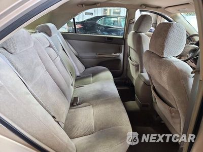 Zdjęcie 10 z 12 samochodu: 2004 TOYOTA CAMRY LE VIN:4T1BE32K64U868251 - miniatura