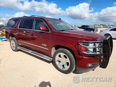 Czwarte zdjęcie samochodu z boku: 2017 CHEVROLET SUBURBAN C1500 LT VIN:1GNSCHKC7HR119815 - miniatura