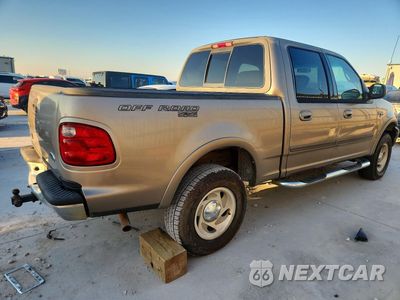Trzecie zdjęcie samochodu z tyłu: 2001 FORD F150 SUPERCREW VIN:1FTRW08L21KA41059 - miniatura