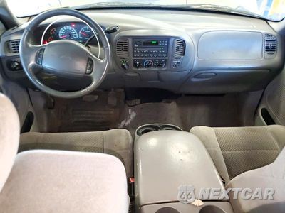 Zdjęcie 8 z 12 samochodu: 2001 FORD F150 VIN:2FTRX18L01CA54464 - miniatura