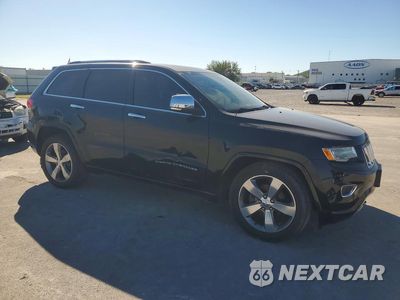 Czwarte zdjęcie samochodu z boku: 2016 JEEP GRAND CHEROKEE OVERLAND VIN:1C4RJFCG7GC427443 - miniatura
