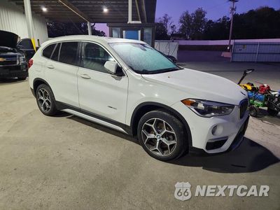 Czwarte zdjęcie samochodu z boku: 2016 BMW X1 XDRIVE28I VIN:WBXHT3C33G5E47944 - miniatura
