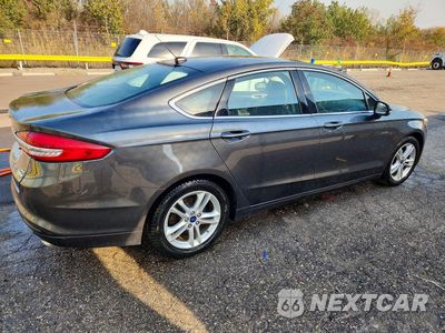 Trzecie zdjęcie samochodu z tyłu: 2018 FORD FUSION SE VIN:3FA6P0HD3JR158126 - miniatura