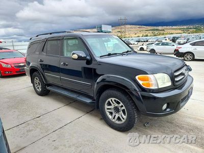 Czwarte zdjęcie samochodu z boku: 2003 TOYOTA SEQUOIA LIMITED VIN:5TDBT48A23S193953 - miniatura