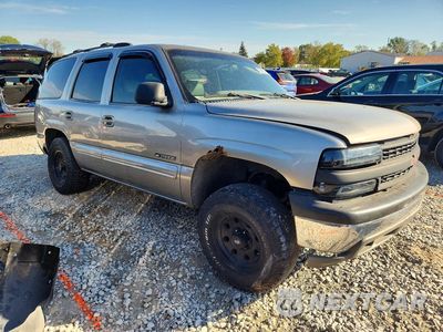 Czwarte zdjęcie samochodu z boku: 2001 CHEVROLET TAHOE K1500 VIN:1GNEK13T51R135619 - miniatura