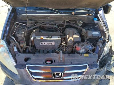 Zdjęcie 12 z 13 samochodu: 2006 HONDA CR-V LX VIN:JHLRD78566C031669 - miniatura