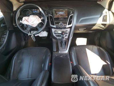 Zdjęcie 8 z 12 samochodu: 2014 FORD FOCUS TITANIUM VIN:1FADP3J29EL234289 - miniatura