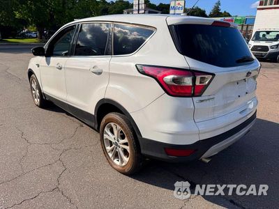 Trzecie zdjęcie samochodu z tyłu: 2017 FORD ESCAPE SE VIN:1FMCU9GD8HUC04625 - miniatura