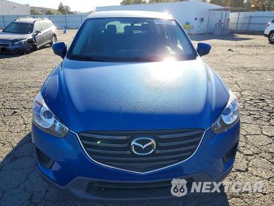 Piąte zdjęcie samochodu w środku: 2014 MAZDA CX-5 SPORT VIN:JM3KE2BE9E0373969 - miniatura