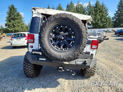 Zdjęcie 6 z 13 samochodu: 2010 JEEP WRANGLER UNLIMITED RUBICON VIN:1J4HA6H11AL107827 - miniatura