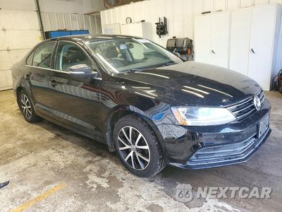 Czwarte zdjęcie samochodu z boku: 2017 VOLKSWAGEN JETTA SE VIN:3VWB67AJ3HM214316 - miniatura