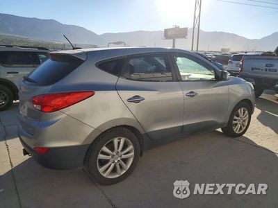Trzecie zdjęcie samochodu z tyłu: 2010 HYUNDAI TUCSON LIMITED VIN:KM8JUCAC1AU034084 - miniatura