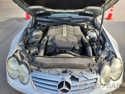 Zdjęcie 11 z 12 samochodu: 2004 MERCEDES-BENZ SL 500 VIN:WDBSK75F44F066173 - miniatura