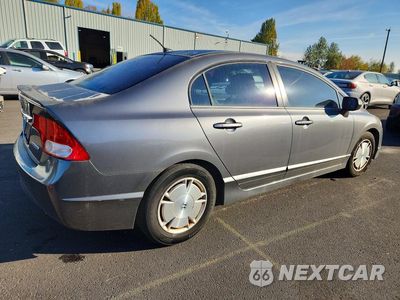 Trzecie zdjęcie samochodu z tyłu: 2010 HONDA CIVIC HYBRID VIN:JHMFA3F29AS007440 - miniatura