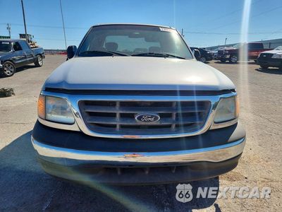 Piąte zdjęcie samochodu w środku: 2003 FORD F150 VIN:1FTRX17263NA77270 - miniatura