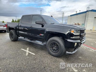 Czwarte zdjęcie samochodu z boku: 2016 CHEVROLET SILVERADO K1500 LTZ VIN:3GCUKSEC3GG274325 - miniatura