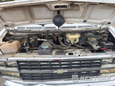 Zdjęcie 12 z 13 samochodu: 1994 CHEVROLET G20 VIN:1GBEG25K8RF183850 - miniatura