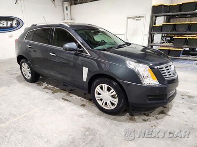 Czwarte zdjęcie samochodu z boku: 2015 CADILLAC SRX LUXURY COLLECTION VIN:3GYFNBE31FS599013 - miniatura