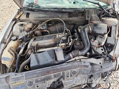Zdjęcie 11 z 13 samochodu: 2004 CHEVROLET CAVALIER VIN:1G1JC12F747347883 - miniatura