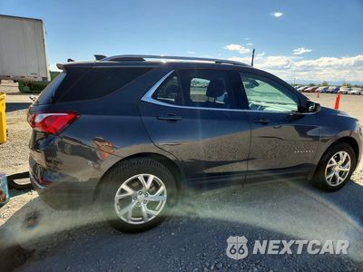 Trzecie zdjęcie samochodu z tyłu: 2020 CHEVROLET EQUINOX LT VIN:2GNAXVEX2L6232122 - miniatura