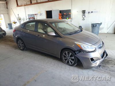 Czwarte zdjęcie samochodu z boku: 2014 HYUNDAI ACCENT GLS VIN:KMHCU4AE5EU620518 - miniatura