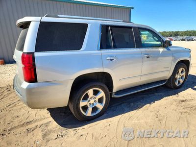 Trzecie zdjęcie samochodu z tyłu: 2019 CHEVROLET TAHOE C1500 PREMIER VIN:1GNSCCKC7KR213252 - miniatura